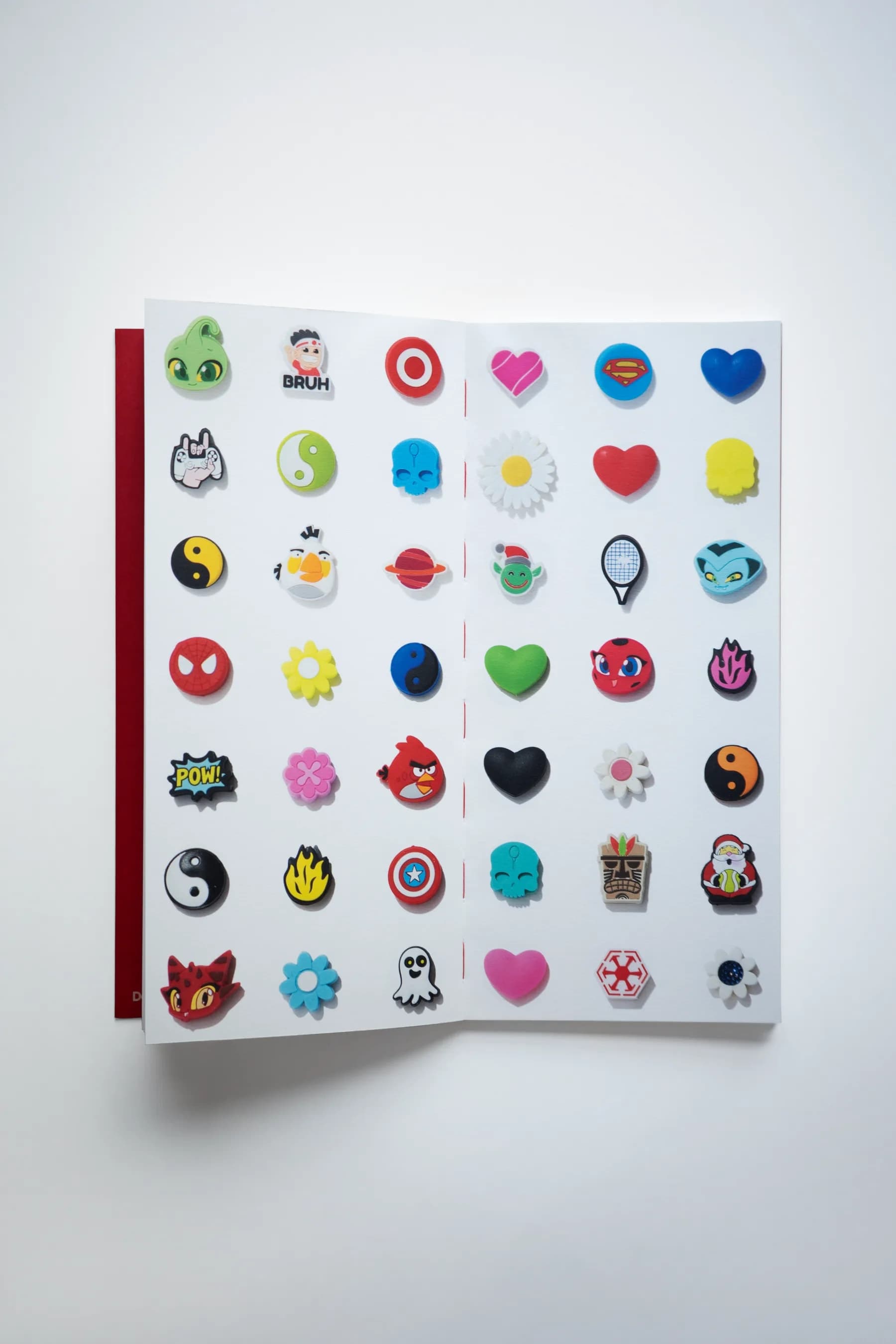 STRUNG: Issue 001 opened to a spread from the dampener archive, a grid of dampeners at actual scale